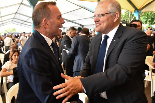 Former prime minister Tony Abbott and Prime Minister Scott Morrison at Good Friday Easter services at St Charbel's Catholic Maronite Church at Punchbowl.