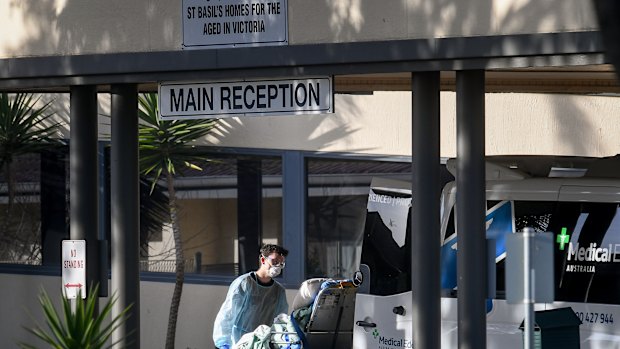 Residents are removed from St Basil's Home for the Aged, the site of Australia's deadliest COVID-19 outbreak.