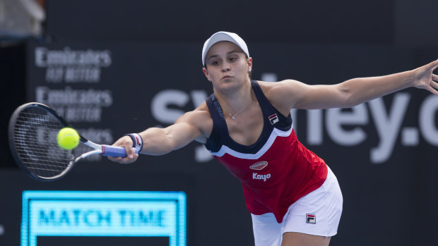 Bridesmaid again: Ash Barty stretches for a forehand in a tense Sydney International final.