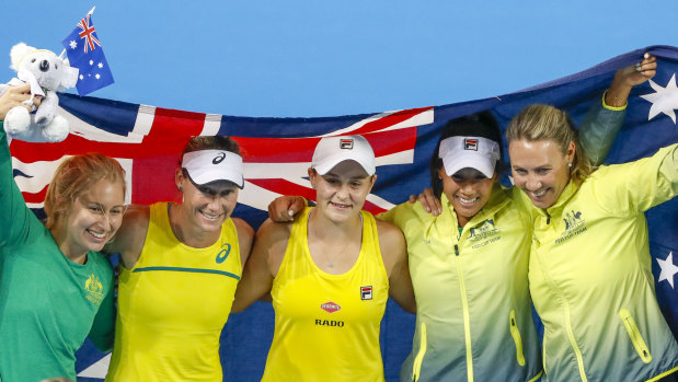Daria Gavrilova, Stosur, Barty, Priscilla Hon and Alicia Molik celebrate Australia's win.