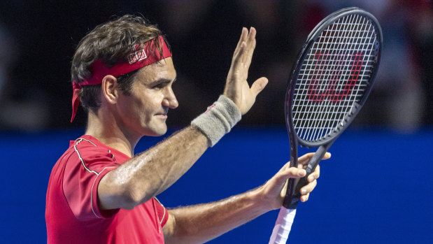Home-town hero Roger Federer salutes the crowd after his victory.