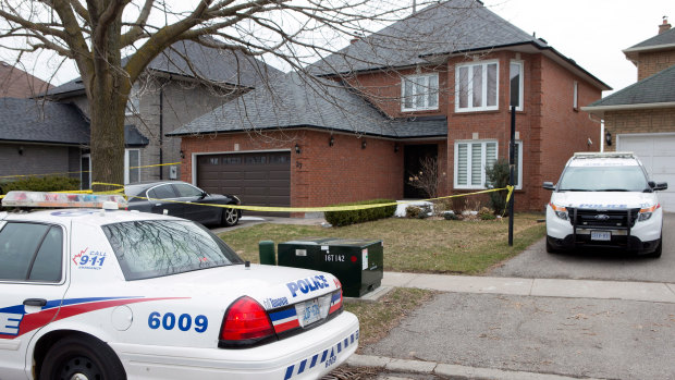 Police cars parked outside of of the Toronto area home of Alek Minassian in Richmond Hill, Ontario in 2018. 