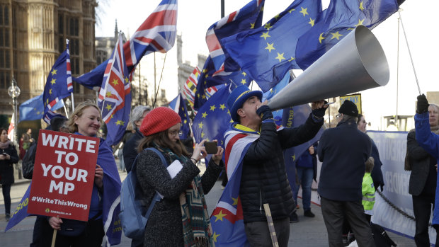 Demonstrators outside Parliament in London on Tuesday.