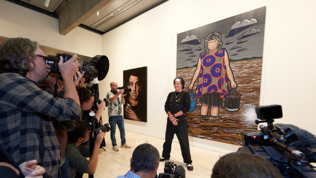 Blak Douglas with his Archibald Prize–winning portrait of artist Karla
Dickens, Moby Dickens 2022. Artwork © Blak Douglas