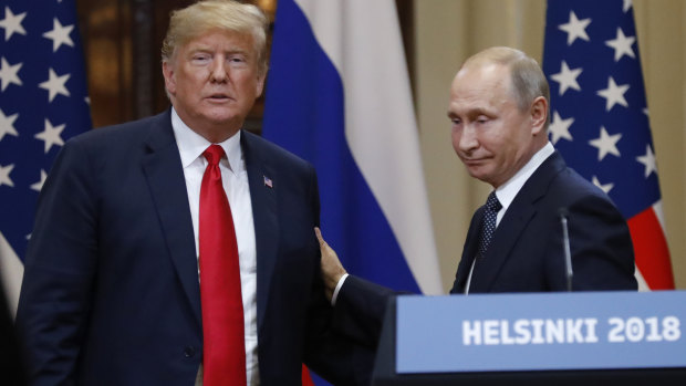 US President Donald Trump, left, and Russian President Vladimir Putin after their summit.