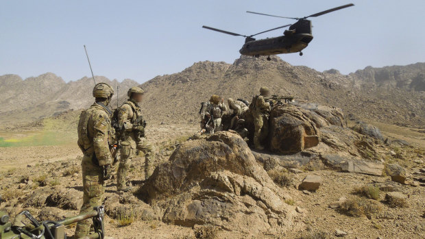 Australian Army soldiers from Special Operations Task Group establish a position in Kandahar province, southern Afghanistan, in 2012. 