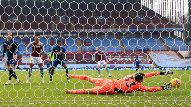 Ollie Watkins of Aston Villa scores his team’s first goal past Mat Ryan of Arsenal during the Premier League match.