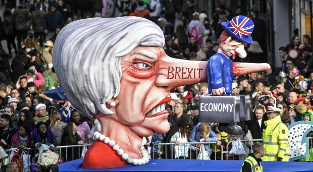 A float depicts British Prime Minister Theresa May during the traditional carnival parade in Dusseldorf, Germany on March 4. 