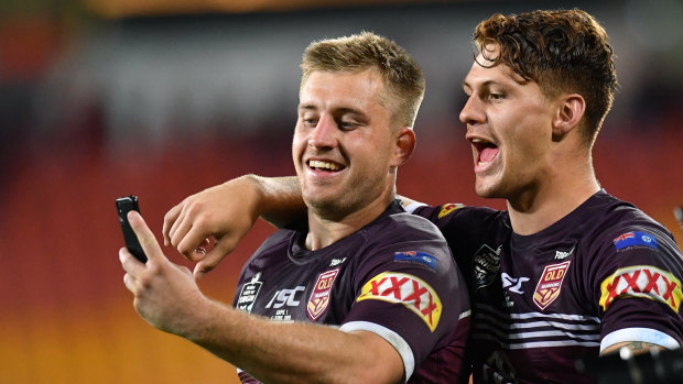 Laughing:  Cameron Munster takes a happy snap with Kalyn Ponga after Origin I.