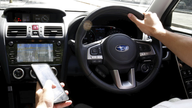 Motorists are four times more likely to have a crash if they're driving and using their phone, says the RACQ.