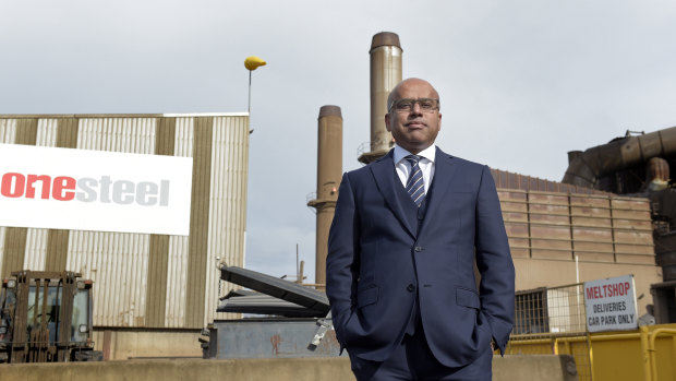 Sanjeev Gupta standing outside one of the OneSteel mills he bought in 2017.