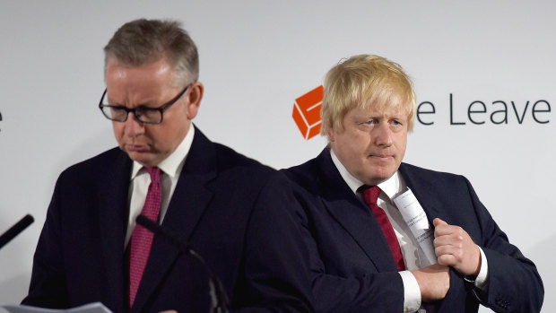 Cabinet minister Michael Gove, who is responsible for overseeing no-deal preparations, and British Prime Minister Boris Johnson.