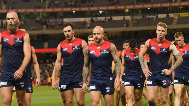 Melbourne players after the loss.