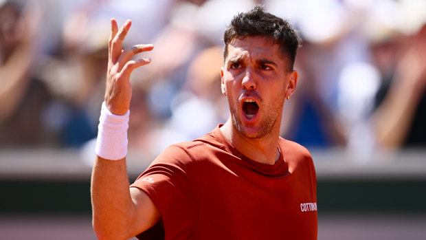 Thanasi Kokkinakis shows his emtions on his way to defeat at the hands of Karen Khachanov at the French Open.