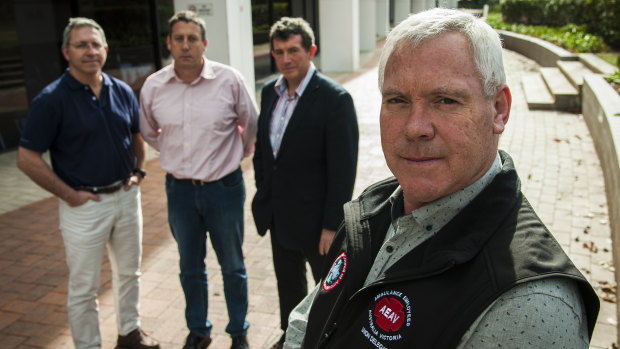 Steve McGhie during his time as president of the National Council of Ambulance Unions with paramedics in Canberra.