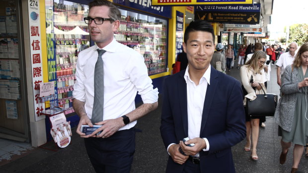 Scott Yung, right, and NSW Treasurer Dominic Perrottet campaigning in Hurstville during the state election.