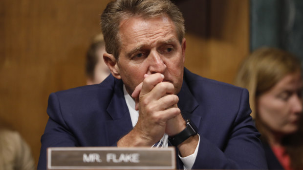 Republican Senator Jeff Flake made a dramatic last minute intervention, asking for an FBI investigation.