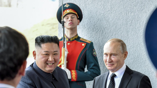 Russian President Vladimir Putin, right, and North Korean leader Kim Jong-un meet for the first time.