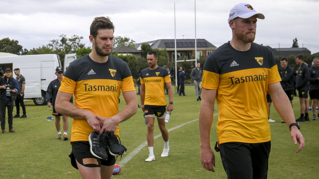 Grant Birchall (centre) with Roughead at training late last year.
