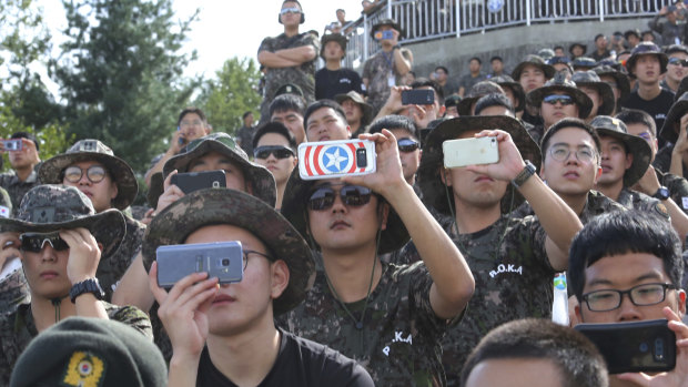 South Korean army soldiers take pictures during training. 