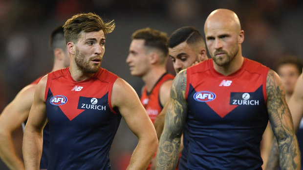 Nathan Jones (right) will no longer lead the Demons with Jack Viney (left).