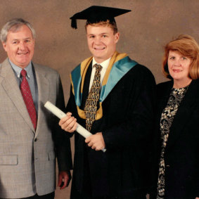 Matt Thistlethwaite with his parents at his university graduation.