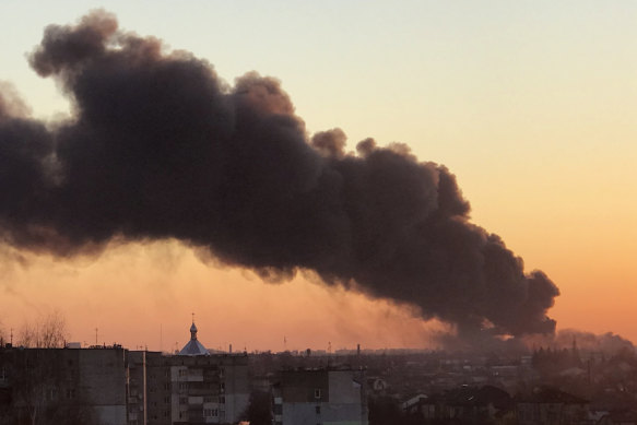 Smoke rises after an explosion in Lviv, western Ukraine, on Friday. The mayor of Lviv said missiles struck near the city’s airport.