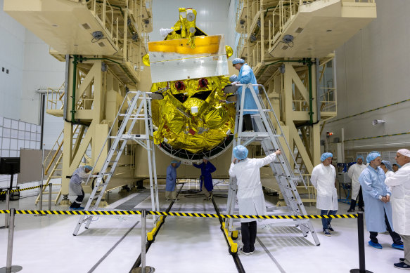 Specialists take part in preparations ahead of the launch of the lunar landing spacecraft Luna-25 mission.