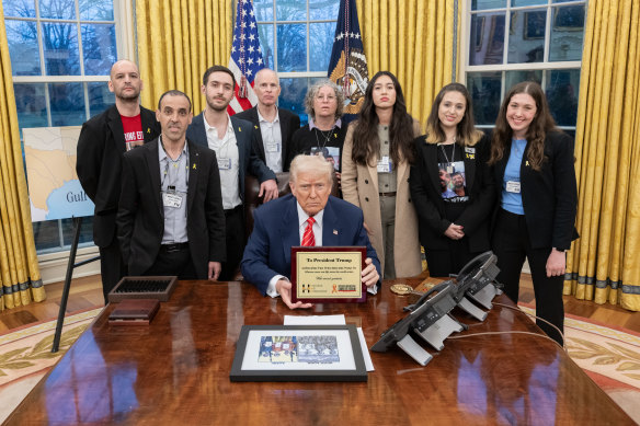 US President Donald Trump with Israeli hostages released from Gaza (from left): Iair Horn, Omer Shem Tov, Eli Sharabi, Keith Siegel, Aviva Siegel, Naama Levy, Doron Steinbrecher and Noa Argamani at the White House.