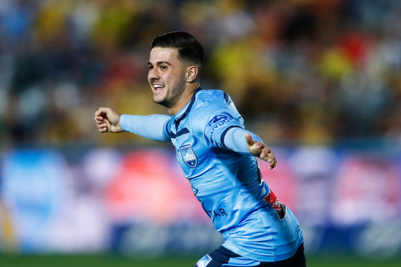 Marco Tilio celebrates the late goal that put Sydney 2-0 up over the Mariners.