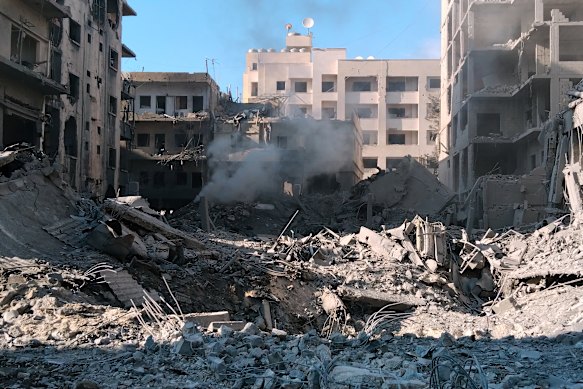 Destroyed buildings in Tire.