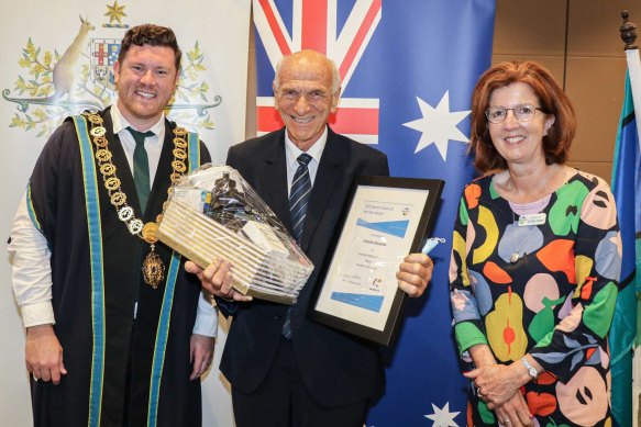 Blimp explosion victim Erminio Rossetto (centre) when awarded the Frankston City senior citizen of the year in 2022. He is pictured with Mayor Nathan Conroy and councillor Sue Baker.
