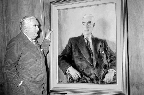 Menzies with the portrait of him painted by Ivor Hele.