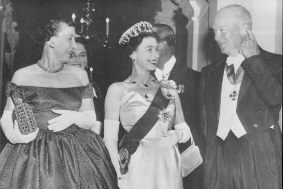 The Queen with president Dwight Eisenhower and Mamie Eisenhower at the British embassy in 1957. 