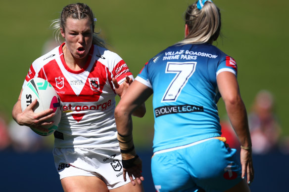 Emma Tonegato runs the ball against the Titans on Sunday.