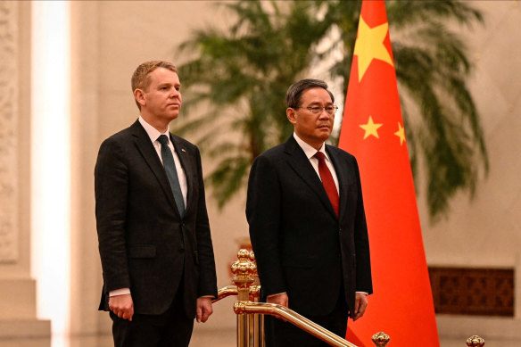 China’s Premier Li Qiang and New Zealand Prime Minister Chris Hipkins attend a welcoming ceremony at the Great Hall of the People in Beijing on June 28.