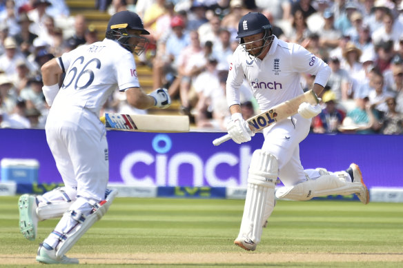 Joe Root and Jonny Bairstow hustle between the wickets.