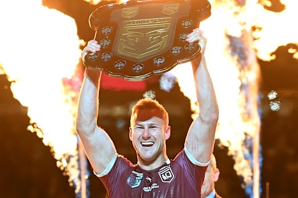 Daly Cherry-Evans celebrates with the shield after winning game three last year.