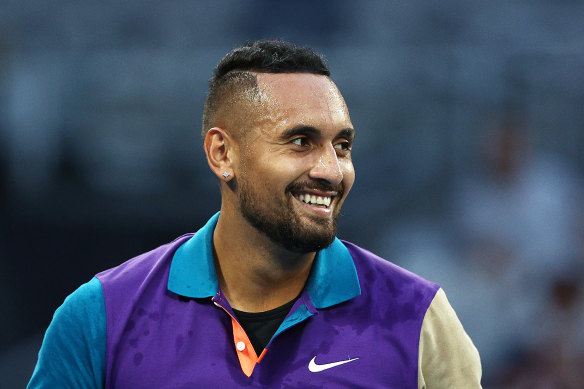 Nick Kyrgios is all smiles after winning a five-set epic against Frenchman Ugo Humbert.