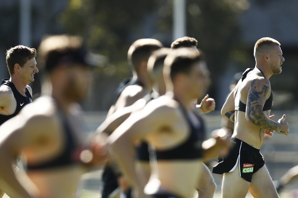 Jordan De Goey, right, in pre-season training. 