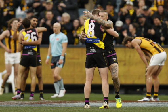Jack Riewoldt and Dustin Martin celebrate Richmond’s big comeback victory over Hawthorn in round 19.