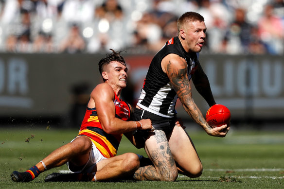Jordan De Goey, right, in action against the Crows. 