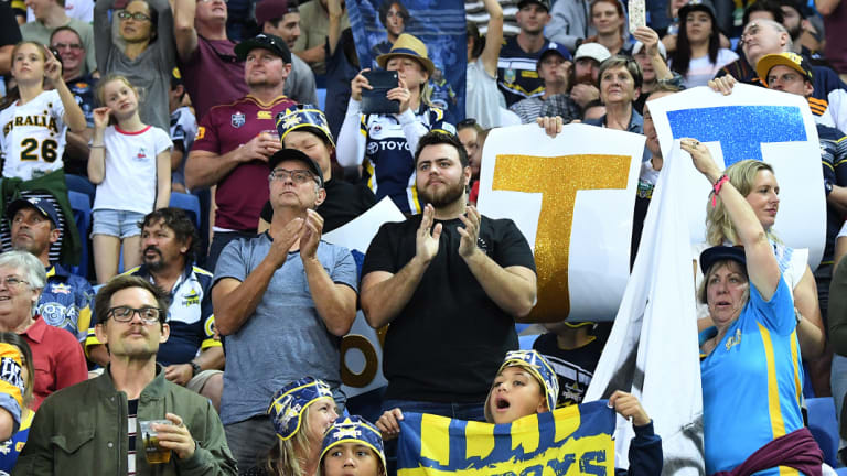 Standing ovation: Fans applaud Johnathan Thurston at the seven-minute mark of the game.