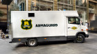 An Armaguard truck in Martin Place in Sydney. The RBA will host a meeting this week with the banks to discuss the plan for when its emergency funding runs out in five months.