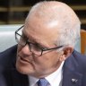 Alex Hawke and Scott Morrison sit next to each other in parliament, reflecting their longstanding political friendship.