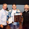 Hayden Jones receiving an award for his CFMEU work on the Cairns Convention Centre site, with Michael Ravbar (left) and Jade Ingham.