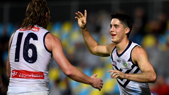 Adam Cerra celebrates a goal for Fremantle.
