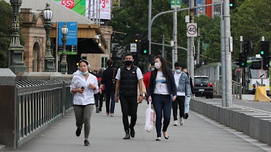 Wearing masks outdoors will remain mandatory for the time being.