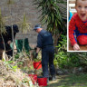 NSW Police search the gardens below a balcony at the home from which William Tyrrell disappeared.