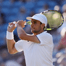 Australian Aleks Vukic (hat) will face defending champion Carlos Alcaraz in the second round at Wimbledon.